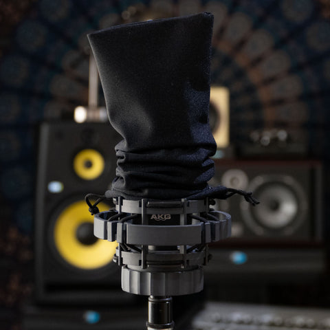 AKG 414 mic on a stand with synthetic dust free mic medium-large cover