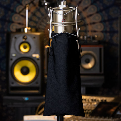 Lauten Audio FC-387 mic upside down on a stand with synthetic dust free large mic cover